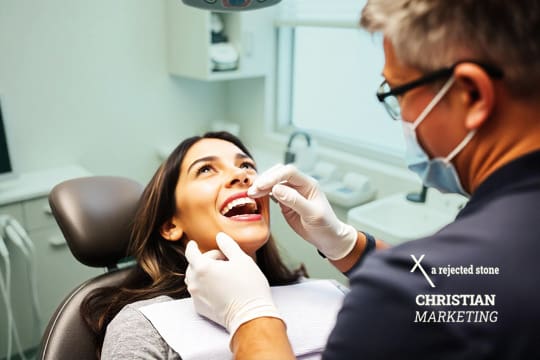 Dentist examining the teeth of a young lady