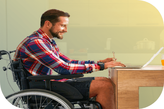 Freelancer working at home in a wheelchair 