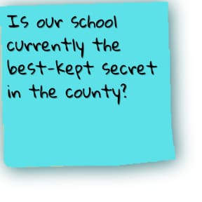 Blue Post-It note saying "Is our school currently the best-kept secret in the county?"